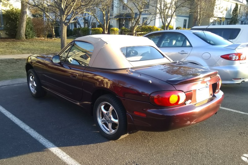 Pretending to be just another car in the parking lot, never mind the jack stands.